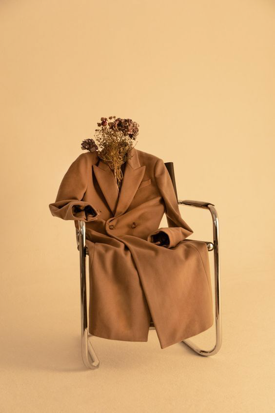 Coat on a chair with flowers